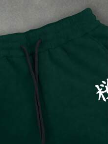 Manfinity EMRG 男士抽繩腰花卉印花休閒日常運動長褲 - 墨綠色 - 查看 7