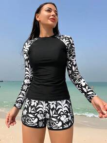 Swim SPRTY 2026新款四季通用夏季海灘熱帶印花落肩袖防曬泳裝女款背心細肩帶比基尼 - 黑與白 - 查看 1