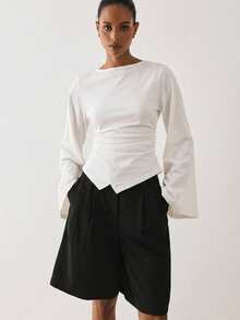 ATUI Studio Women's Tencel Wool Blend Bell Sleeve Knitted Ruched Waist T-Shirt With Asymmetric Hem - White - View 3