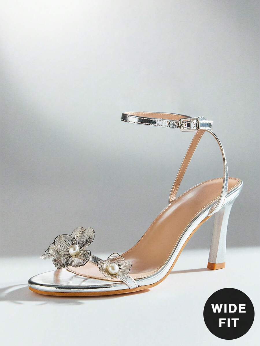 SHUZIA Women's Wide-Fit Minimalist Fashion Comfy Round Toe Floral Decor Stiletto Heel Sandals - Metallic Silver - View 1