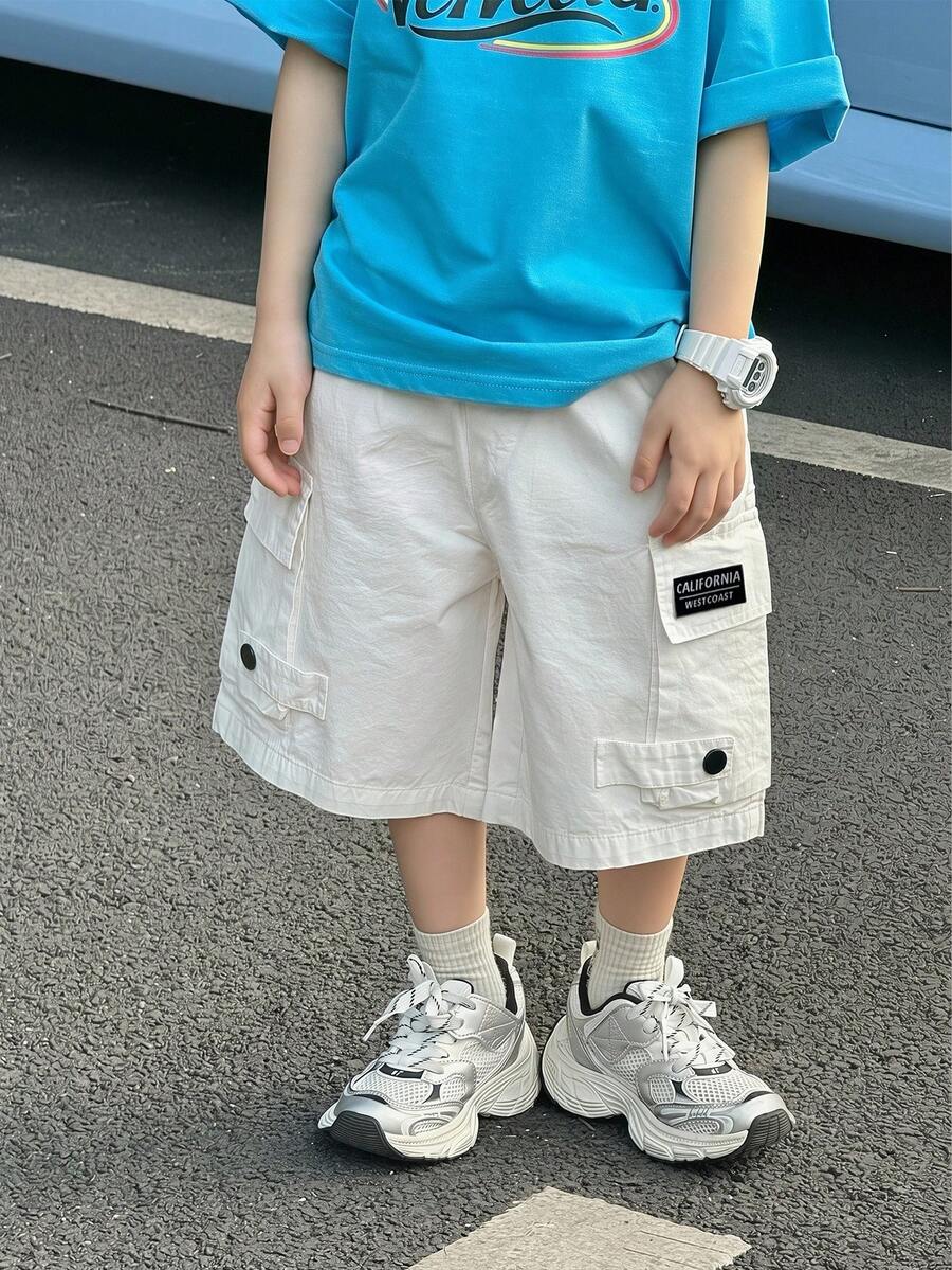 1件装男童休闲时尚帅气百搭舒适宽松工装短裤，适合春夏穿着，适合日常穿着、运动、郊游、上学、聚会、节日、演出和摄影等场合。