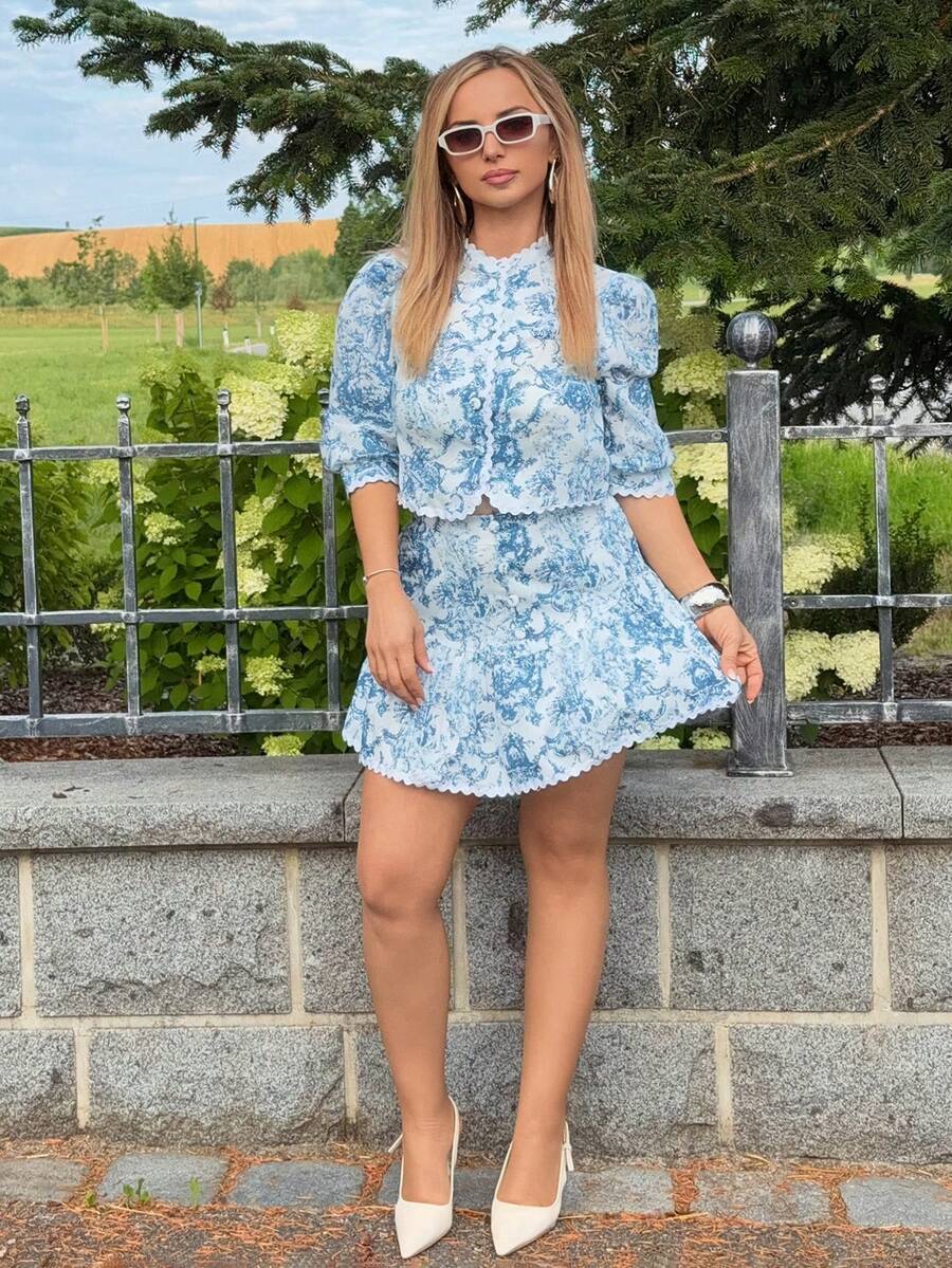 Jeta Ari Set Kemeja Lengan Puff dan Rok Mini Motif Cetak Seluruh Permukaan Kasual untuk Liburan yang Elegan - Biru - View 1