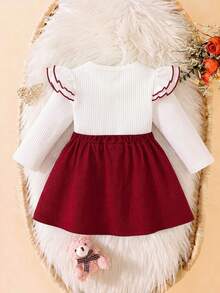 SHEIN Playful Pals Conjunto de niña bebé unisex para bebé y niño pequeño de 0 a 3 años, estilo elegante para primavera/otoño, top de cuello redondo con detalle de lazo y falda roja, ajuste casual adecuado para salidas, ocio y fiestas - Rojo - Ver 2