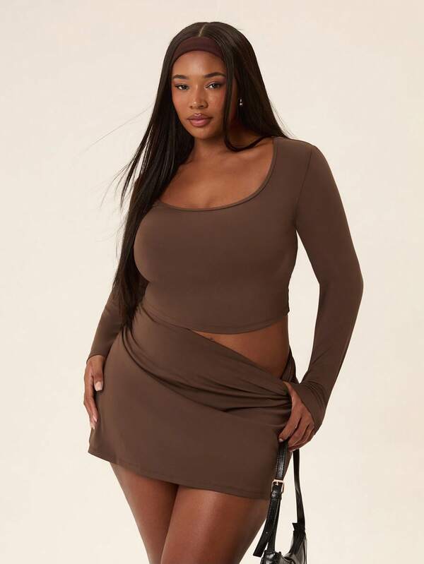 Voyena Plus Size Women Solid Color Cropped Sports T-Shirt & Tight Skort Fitness Set