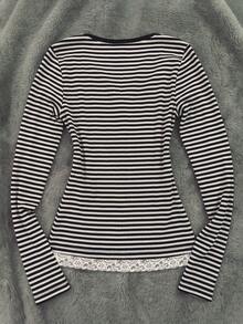 IslaSuriya Women's Long Sleeve Top With Striped Patchwork And Ruffle Hem - Black and White - View 2