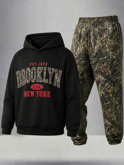 SHEIN 2pcs Kids Tween Boy Casual Daily Versatile Comfortable Large Letter Print Pattern Black Hoodie Loose Pullover Long Sleeve Sweatshirt Camouflage Dry Leaf Cuffed Loose Sweatpants Knit Sweatshirt Set 2-Piece Outfit Suitable For Daily Wear, School, Travel, Sports, Autumn/Winter