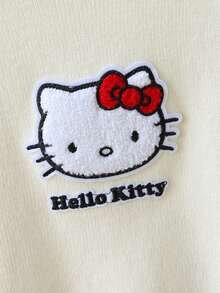 HELLO KITTY AND FRIENDS | SHEIN GraphicGems 女童V領刺繡上衣設計蝴蝶結黑色米色針織毛衣 女孩服飾 舒適柔軟 運動風 百搭多功能 甜美可愛 休閒簡約 日常穿著 適合秋冬旅行出遊派對戶外玩耍 - 杏色 - 查看 5
