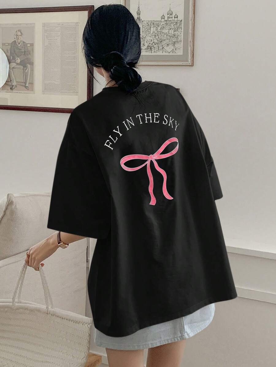 DAZY 女式夏季字母蝴蝶结印花宽松休闲 T 恤,圆领落肩袖,可爱上衣,超大 T 恤,图案 T 恤,学院风上衣 - 黑色 - 查看 1