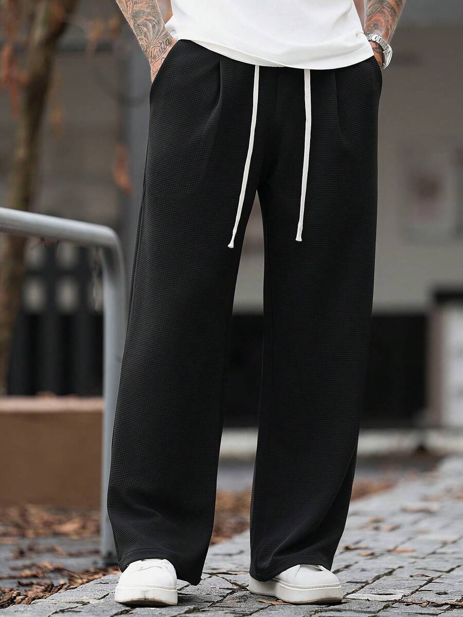 Manfinity CasualCool Celana Jogging Pria Dewasa Kasual Hitam Bertekstur Kain Longgar Potongan Lurus - Hitam - View 1