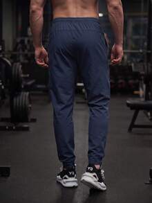 GymBeat Men Sports Pants - Biru - View 2