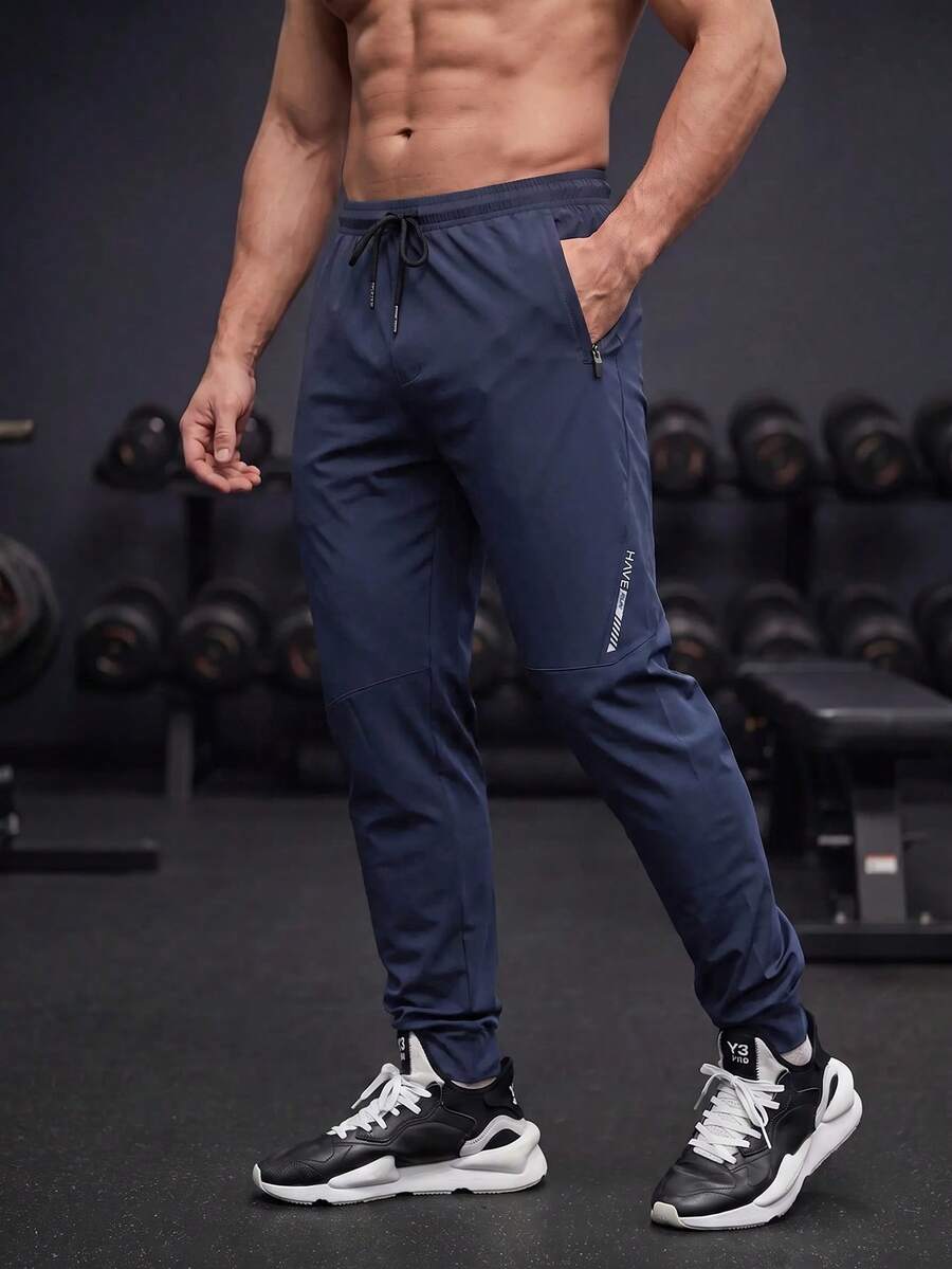 GymBeat Men Sports Pants - Biru - View 1