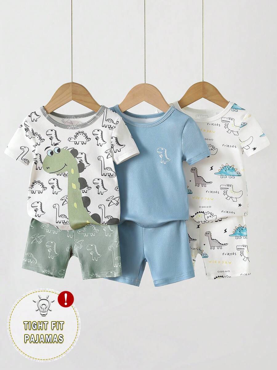 SHEIN 6件套幼儿男童贴身睡衣套装,图案包括海洋鲨鱼、恐龙、火箭和行星,采用柔软舒适的弹力面料制成,色彩鲜艳明快,适合儿童穿着。 - 彩色 - 查看 1