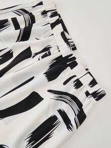 Rusticease Setelan Kasual 2 Potong untuk Wanita Ukuran Plus: Kemeja Lengan Gulung Warna Polos dan Celana Panjang Lebar Motif Sikat - Hitam dan Putih - View 9