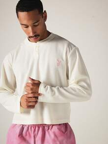 PLAYBOY X SUMWON Bunny Embroidered Waffle Knit Henley Long Sleeve Boxy Top With Button Placket Neckline - Beige - View 1