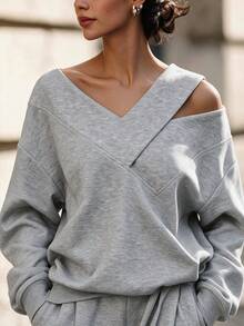 Balvessa Grey Floral Cold Shoulder Asymmetric Collar Design Sweatshirt, Cross Lapel Hollow-Out Dropped Shoulder Lantern Sleeve Loose Casual Pullover Top, Korean Relaxed Sexy Style, Casual Sweet Cool Spicy Girl Style, Street Atmosphere Daily Style, Suitable For Street Casual Outings, Couple Dates, Portrait Street Photography, Pair With Jeans - Light Grey - View 1