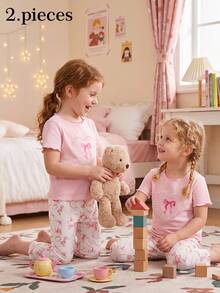 SHEIN Young Girls Pajamas, All-Season Pink Bow, Pearl Heart, Cherry Strawberry Pattern Ruffle Trim Round Neck Pullover T-Shirt With Pink Bow Striped Cherry Long Pants Loungewear Set 1Set - Pink - View 1