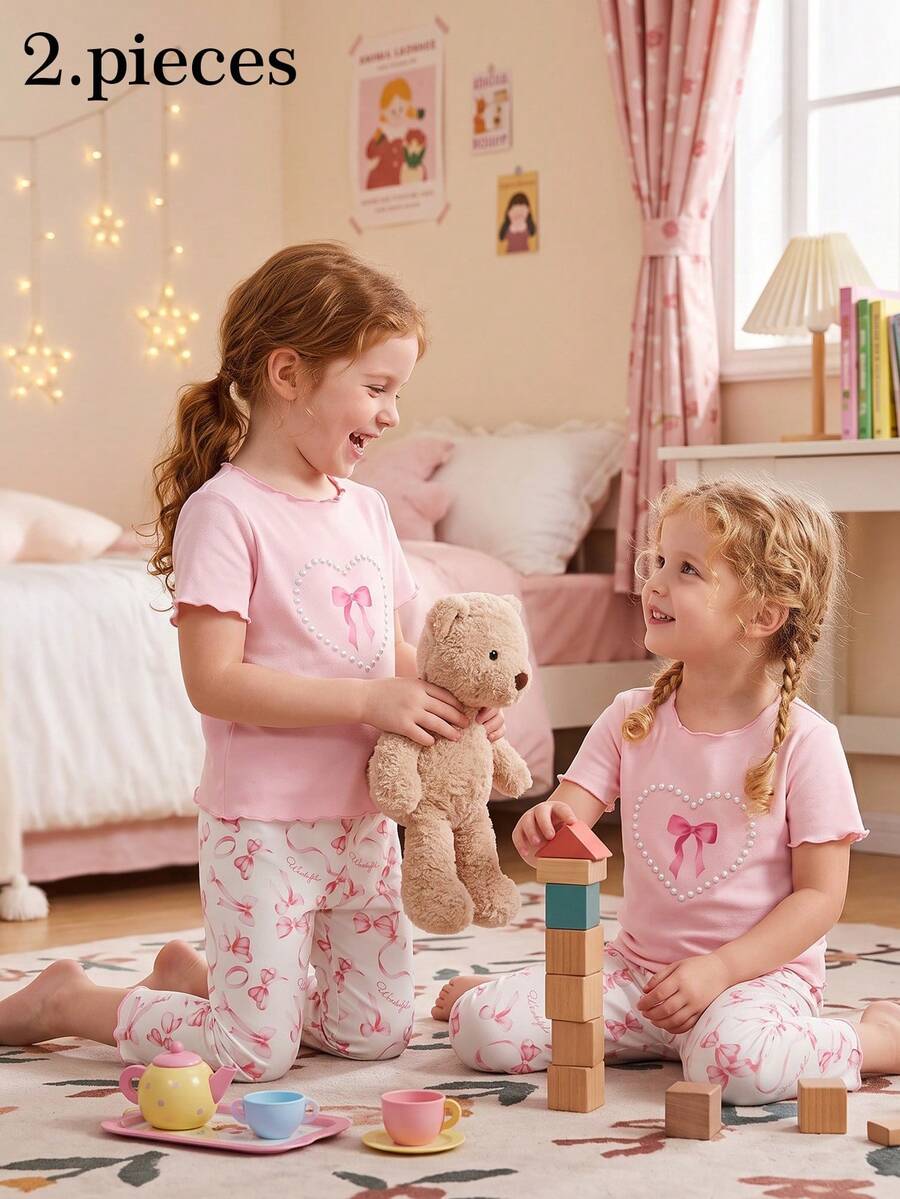 SHEIN Young Girls Pajamas, All-Season Pink Bow, Pearl Heart, Cherry Strawberry Pattern Ruffle Trim Round Neck Pullover T-Shirt With Pink Bow Striped Cherry Long Pants Loungewear Set 1Set - Pink - View 1