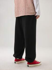 Vaulklash Pantalones de chándal holgados para hombre con bolsillo en diagonal de unicolor - Negro - Ver 3