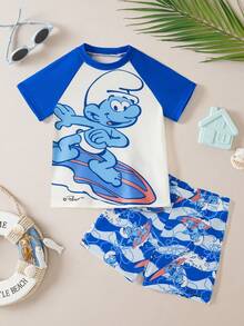 SHEIN X The Smurfs Young Boy Cartoon Print Round Neck Short Sleeve Top And Shorts 2-Piece Swimsuit Set, Suitable For Summer Vacation - Blue - View 1