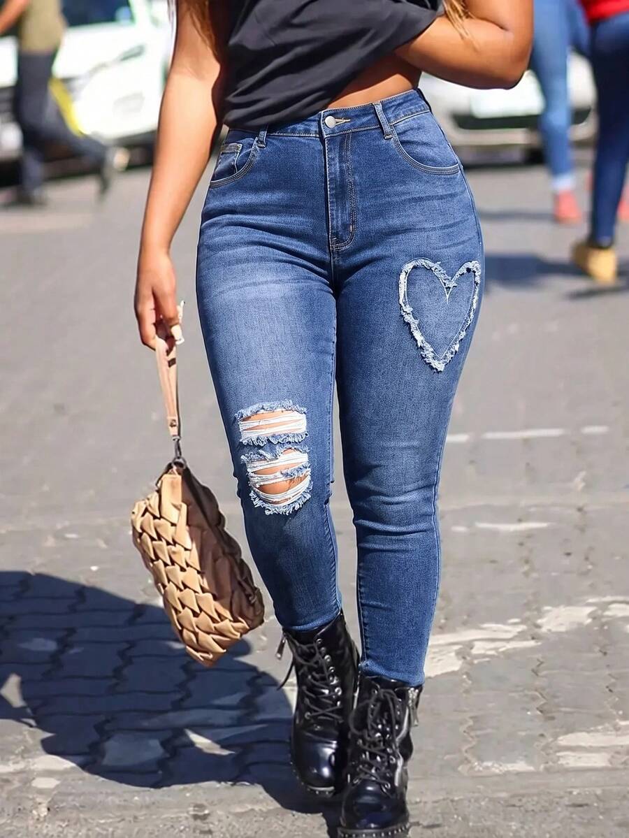 Slaydiva جينز نسائي مقاس كبير بأسلوب كاوبوي أزرق مطاطي مطرز بقلوب ممزق، للخريف