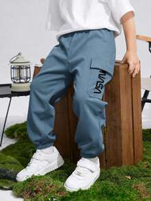 SHEIN Little Byeori Kids Tween Boy Casual Sports Print Pattern Patch Pocket Loose Cuffed Solid Color Cargo Pants, Suitable For Commuting, School, Daily Wear, Vacation, Travel, Sports, Spring, Summer, Autumn, Winter - Blue - View 1