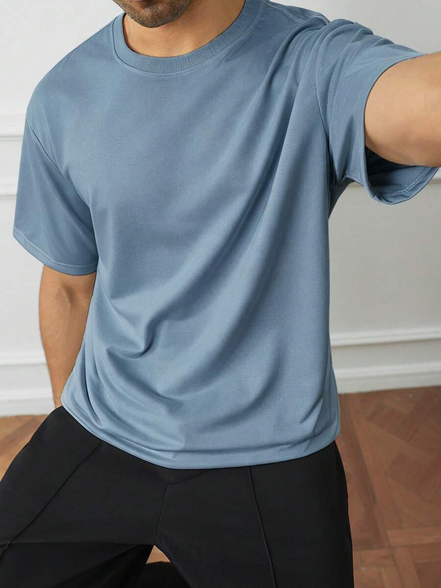 Manfinity Homme 宽松男士纯色圆领 T 恤,简约时尚,适合日常休闲穿着 - 霧霾藍 - 查看 1