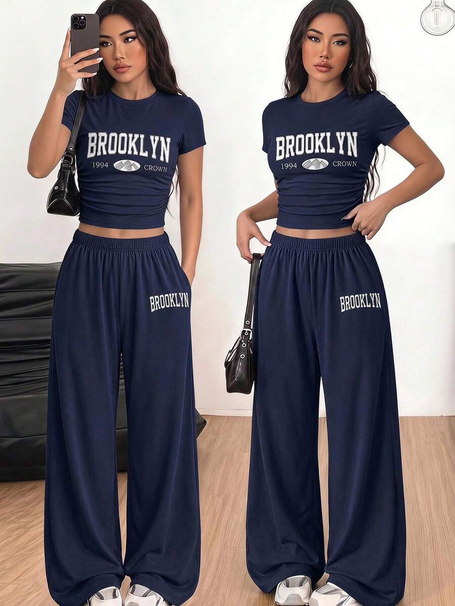 SHEIN 青少年女孩休閒日常百搭舒適寬鬆圓領短袖印花T恤與長褲套裝,夏季穿搭,柔軟針織,適合運動、外出、度假、旅行、學校、校園、大學等 - 藏蓝色 - 查看 1