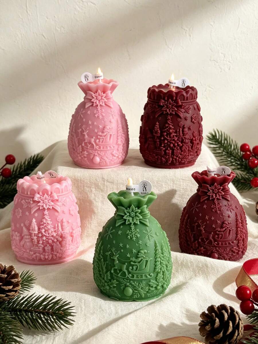 Christmas Embossed Gift Bag With Aromatherapy Candles Featuring Christmas Tree, Elf, Gift, Sleigh, Reindeer, And Snowflake Embossments. Available In 3 Colors: Pink, Green, And Burgundy - Christmas gift bag - View 1