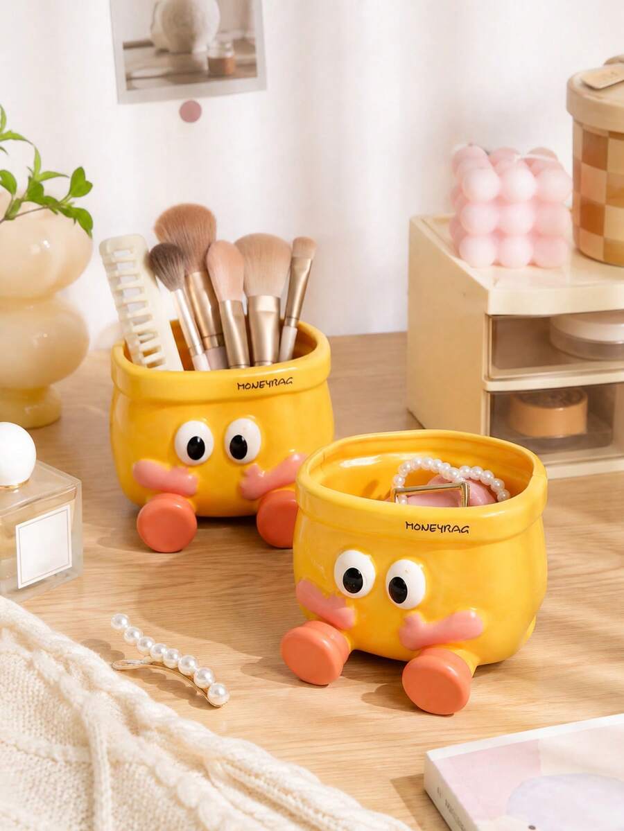 Zazumi Rounded Yellow Pouch Shape Home Accent Organizer Raised Eye Details And Coral Orange Feet For Cream-Style Desk Styling Creating Warm Interior Accent For Lifestyle Users