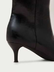Nöista Pointed Toe Ankle Boot With A Clean Silhouette, Slim Mid Heel, Smooth Leather Finish And Inside Zip Closure. Fall Boots - Black - View 7