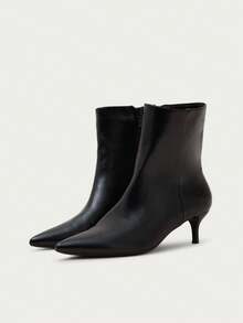 Nöista Pointed Toe Ankle Boot With A Clean Silhouette, Slim Mid Heel, Smooth Leather Finish And Inside Zip Closure. Fall Boots - Black - View 6