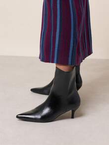 Nöista Pointed Toe Ankle Boot With A Clean Silhouette, Slim Mid Heel, Smooth Leather Finish And Inside Zip Closure. Fall Boots - Black - View 2