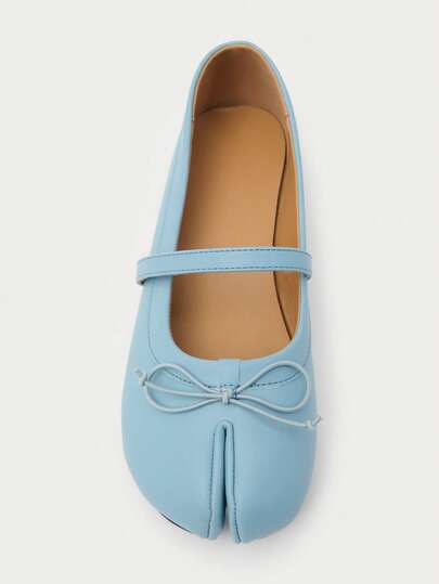 Nöista Light Blue Mary Jane Ballet Flats With Split Toe And Bow Detail. Feminine Design With Contemporary Appeal. Casual