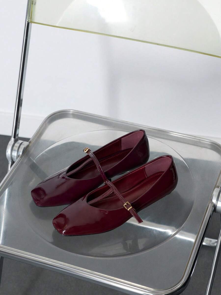 Nöista Burgundy Patent Mary Jane Flat With A Sleek Pointed Toe, Delicate Strap And A Low Heel For Timeless Elegance. - Burgundy - View 1