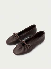 Nöista Deep Brown Ballet Flats With Leather-Effect Finish And Delicate Bow Detail. Timeless Design For Everyday Sophisticated Looks. Casual Fall Shoes - Brown - View 1