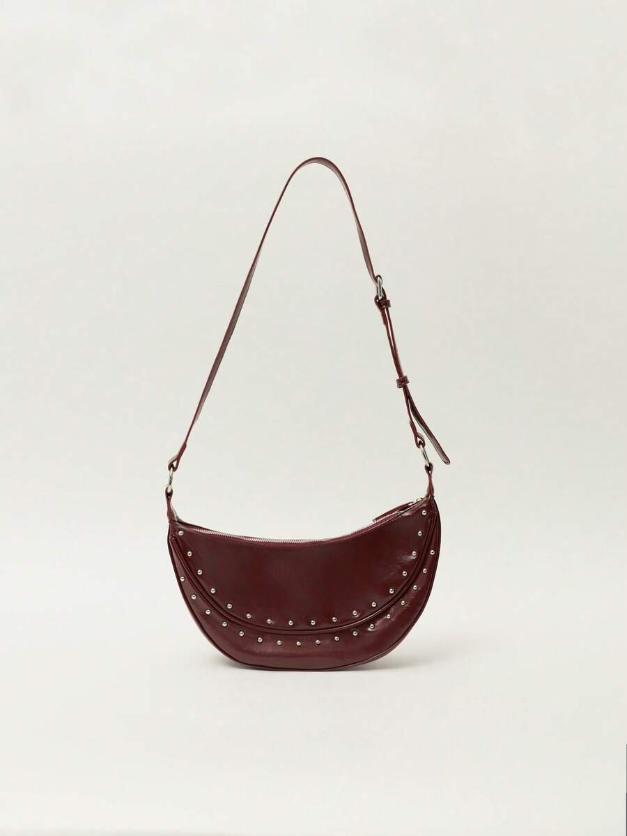 Nöista Burgundy Patent Shoulder Bag With Gold Studs, Curved Silhouette, Zip Closure And Adjustable Strap. - Red - View 1