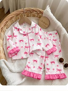 SHEIN Conjunto de pijama para niña bebé con estampado de lazos, ribete de contraste y volantes - Blanco - Ver 3