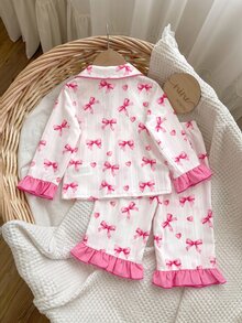 SHEIN Conjunto de pijama para niña bebé con estampado de lazos, ribete de contraste y volantes - Blanco - Ver 8