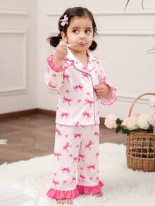 SHEIN Conjunto de pijama para niña bebé con estampado de lazos, ribete de contraste y volantes - Blanco - Ver 5