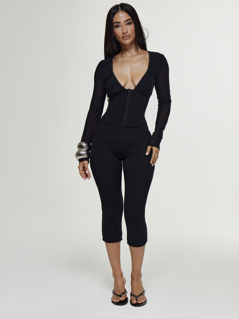 Deep V Plunge Eyelet Fastening Fitted Long Sleeve Capri Jumpsuit