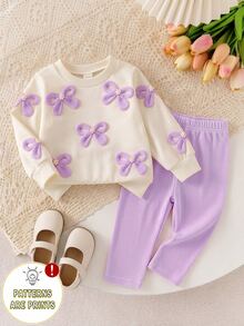 SHEIN Playful Pals 2件組女嬰春夏秋季奶油色與粉色甜美溫柔風 3D針織蝴蝶結滿版印花圓領長袖上衣與直條紋修身長褲套裝，寬鬆舒適，適合日常穿著、戶外玩耍、家庭聚會、1歲生日派對、拍照拍攝 - 紫色 - 查看 1