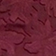 عنابي اللون