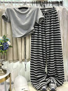 Resyla 夏季時尚休閒女款兩件套，適合日常與運動穿著，淺灰色圓領短袖T恤搭配條紋印花長褲，優雅舒適設計，休閒外出套裝 - 灰色 - 查看 4