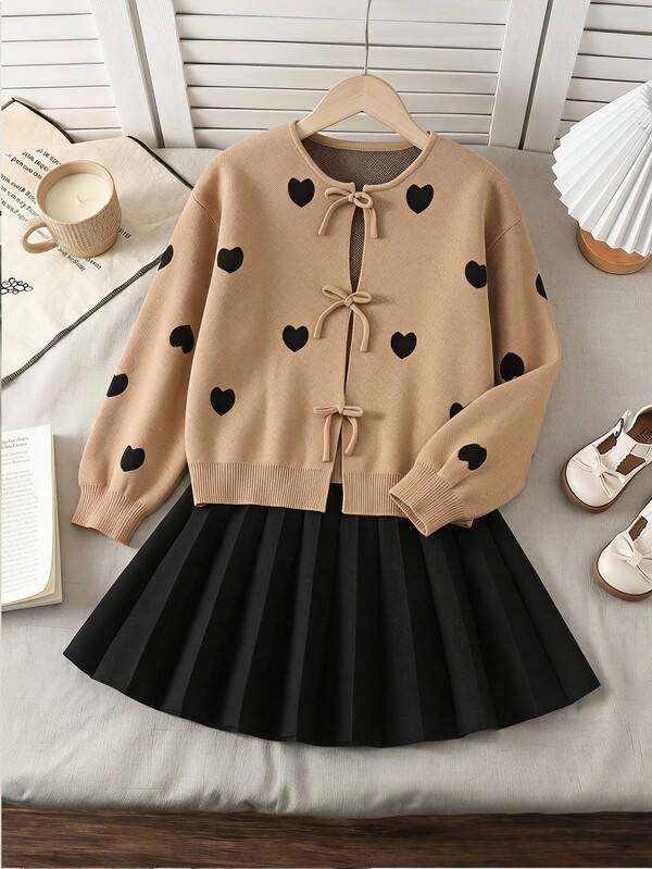 SHEIN Tween Girl Tween Girl Loose Casual Minimalist Comfortable Round Neck Long Sleeve Tie Bow Front Cardigan + Black Knitted Pleated Skirt 2 Pieces Set, Suitable For Fashionable Streetwear And Back To School Outfits