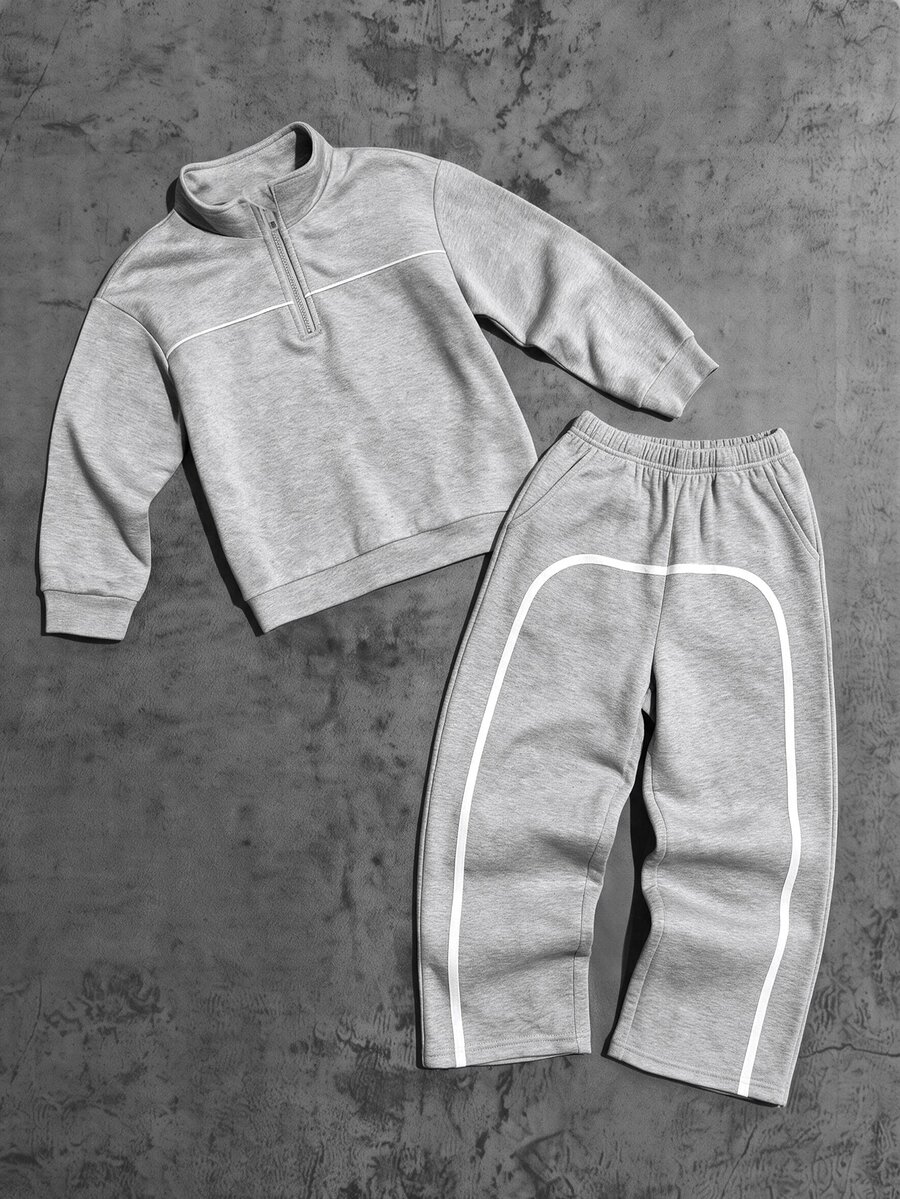 SHEIN Conjunto de 2 piezas para niños preadolescentes: sudadera holgada casual minimalista con cuello semiabierto de cremallera dividida, bolsillo y diseño redondo, con pantalones de pierna recta, adecuado para uso diario, escuela, deportes y ropa casual - Gris - Ver 1