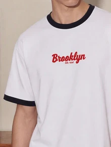 FROVYX 美式復古 Brooklyn 字體對比色圓領短袖 T 恤，適合追求美式極簡風格、強調復古時尚感且喜愛街頭文化的年輕男性 - 黑與白 - 查看 3