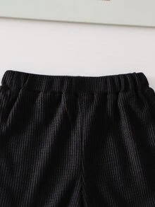 女童波點兩件套，清新優雅，假兩件上衣結合黑色羅紋背心與波點泡泡袖，側邊蝴蝶結增添甜美感，搭配同布料寬腿褲，簡約黑白配色，活潑優雅，適合日常穿著，兒童春秋初秋休閒日常套裝 - 黑與白 - 查看 7