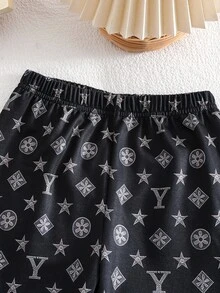 SHEIN 2件組 男童新款秋冬活力針織印花半拉鍊 Polo 領長袖運動衫與運動長褲套裝，舒適面料，時尚版型，適合多季節與多場合穿著 - 黑色 - 查看 7