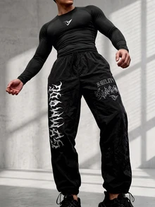 GymBeat Men's Printed Slim Fit Long Sleeve T-Shirt And Drawstring Waist Long Pants Sports Set, Gym - Black - View 1