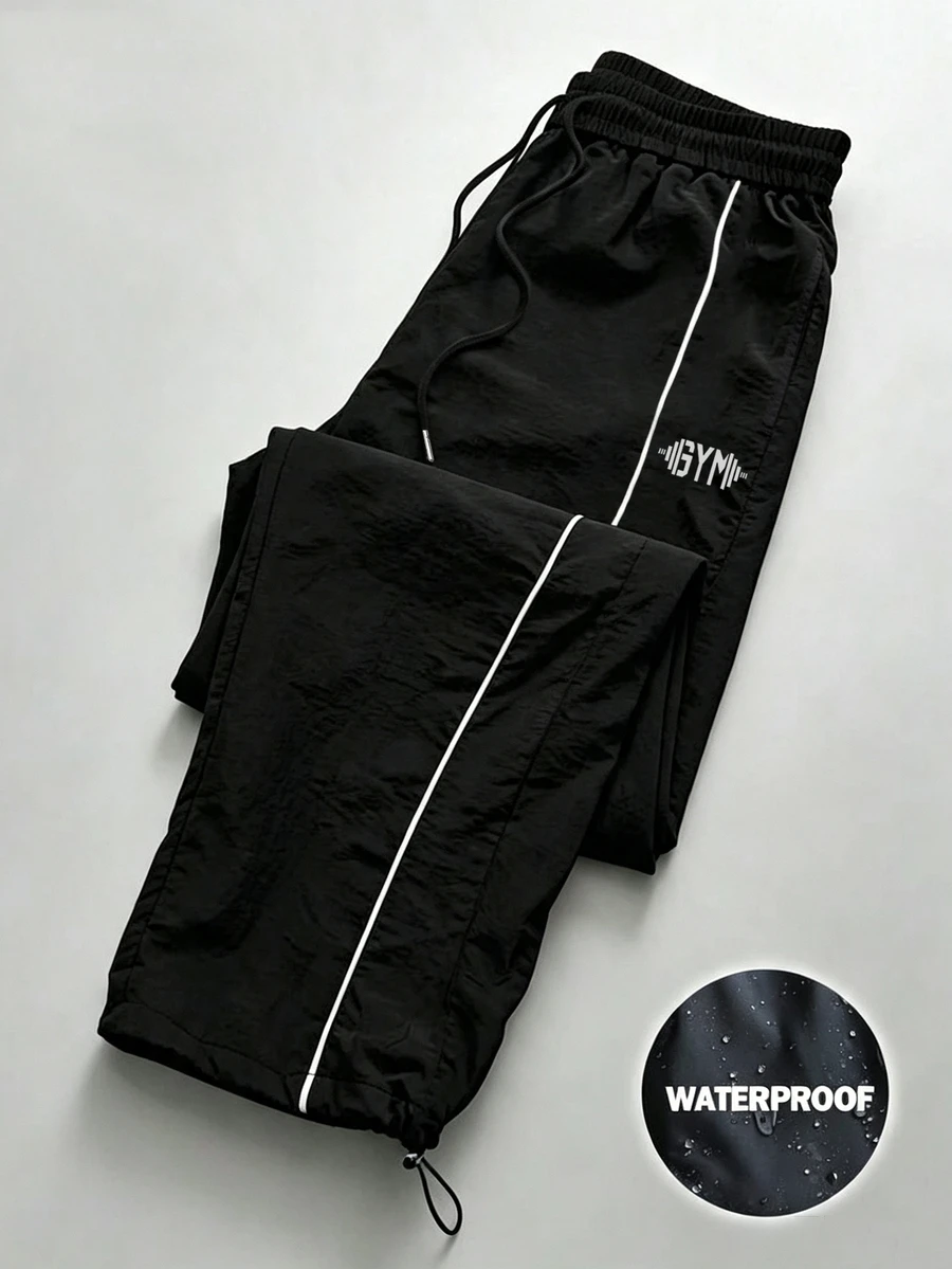 Coreblaze Celana Panjang Olahraga Pria Longgar dengan Motif Huruf dan Tali Serut di Pinggang, untuk Gym - Hitam - View 1
